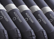 Row of blue inflatable tubes with 'Ventilation' text on a dark background