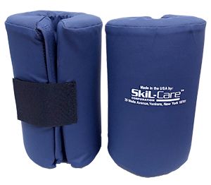 Pair of blue bolsters with a black strap on a white background, branded 'SKIL-Care'.