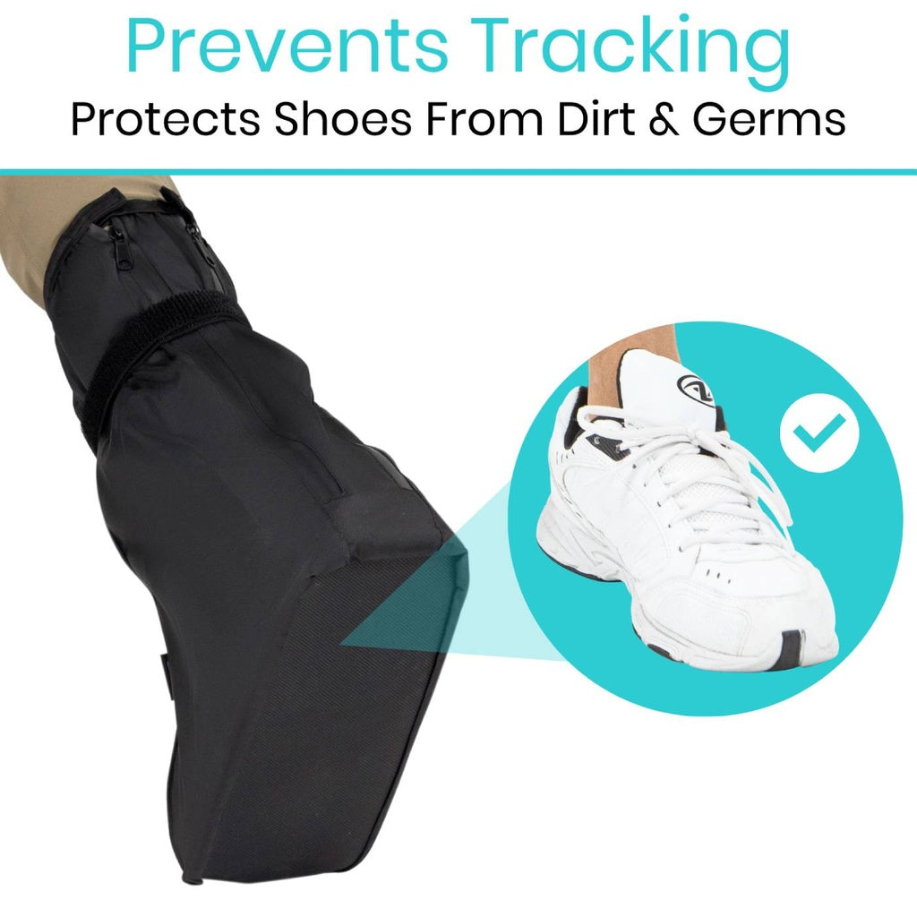 Black shoe cover being worn, with text indicating it prevents tracking and protects shoes from dirt and germs.