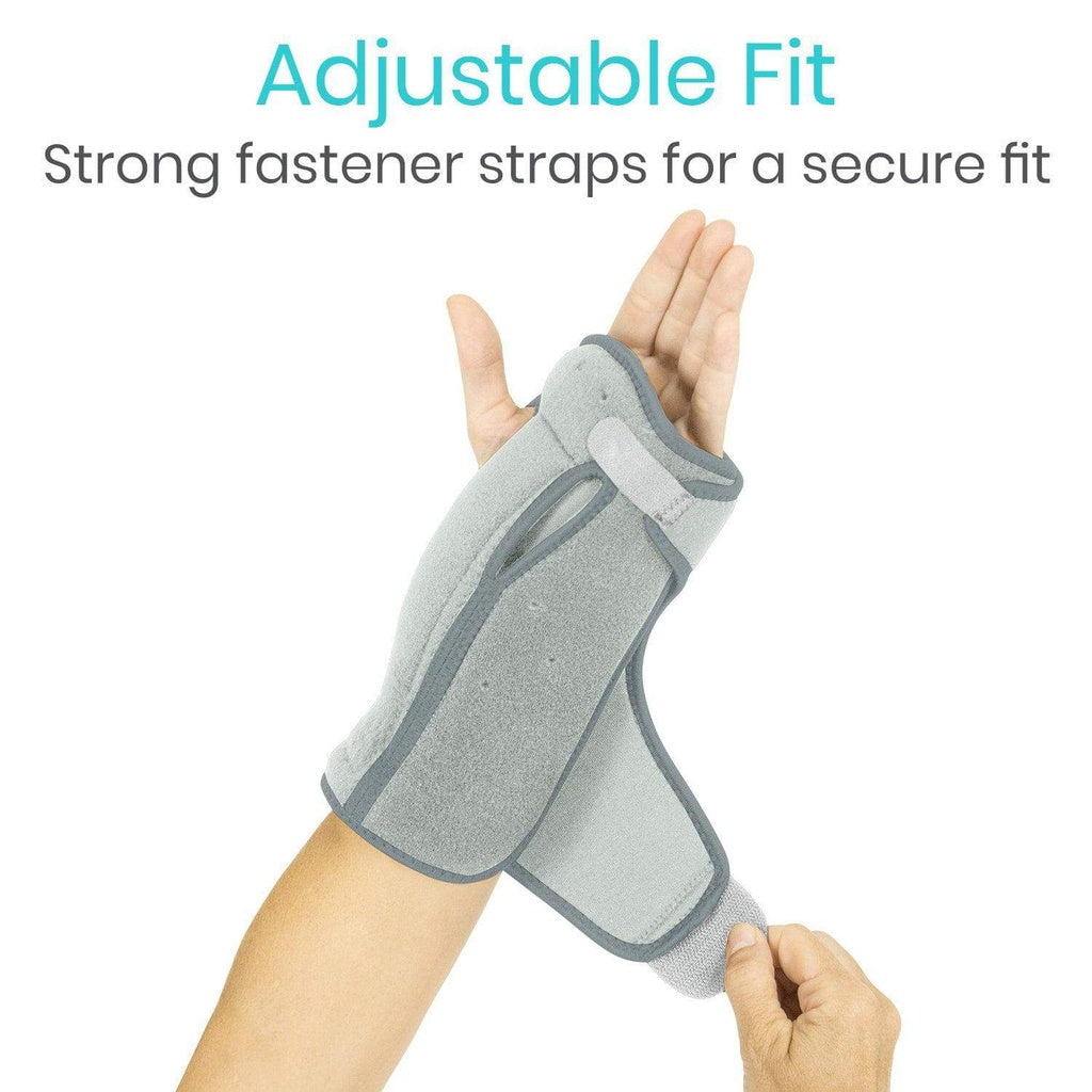 Gray wrist support brace with adjustable fit feature on a white background