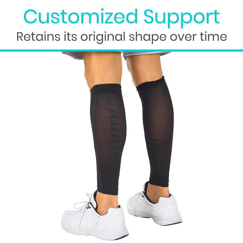 Person wearing black compression sleeves on legs with text about support and shape retention.