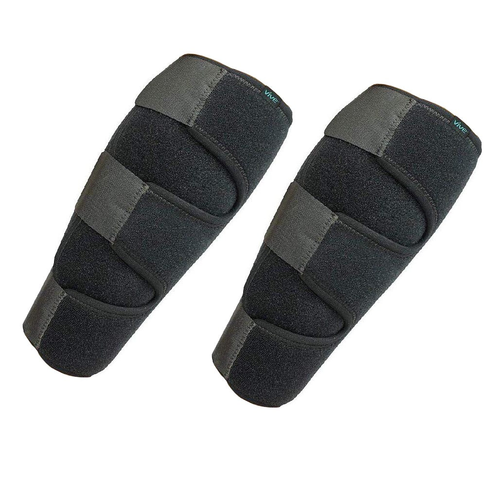 Pair of black and gray protective knee pads on a white background