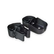 Two black plastic straps with buckles on a white background