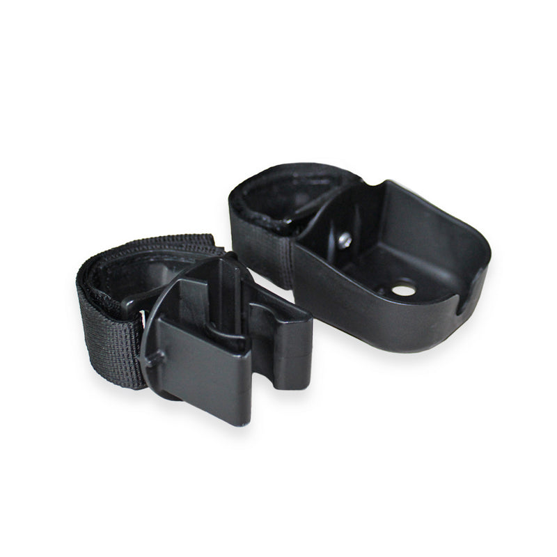 Two black plastic straps with buckles on a white background