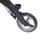 Close-up of a bicycle wheel and suspension fork on a white background