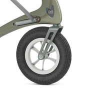 Close-up of a wheel and suspension mechanism on a stroller.
