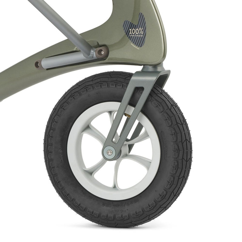 Close-up of a wheel and suspension mechanism on a stroller.