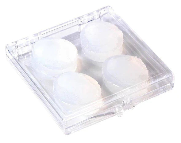 Clear plastic container with four white ear plugs on a white background
