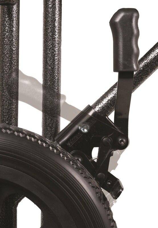 Close-up of a wheelchair's wheel and handle on a white background