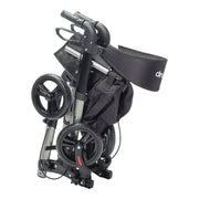 Foldable stroller with a black strap on a white background