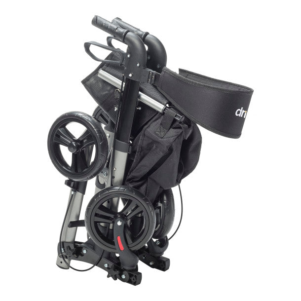 Foldable stroller with a black strap on a white background