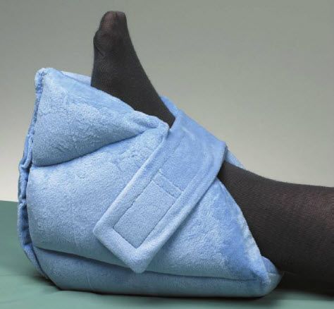 Blue foot pillow on a neutral background