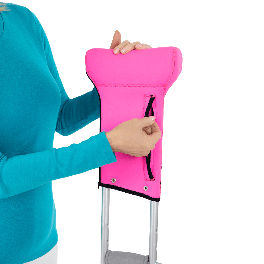 pink crutch pad with zipper for items 