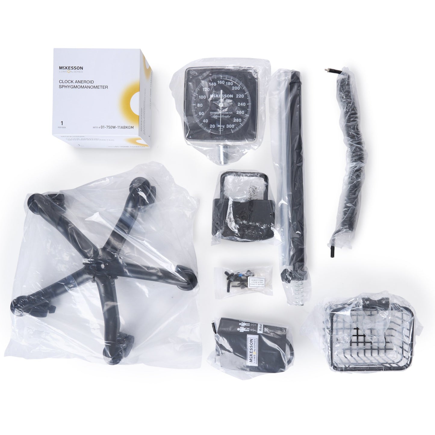 Medical equipment components including a clock and other devices on a white background