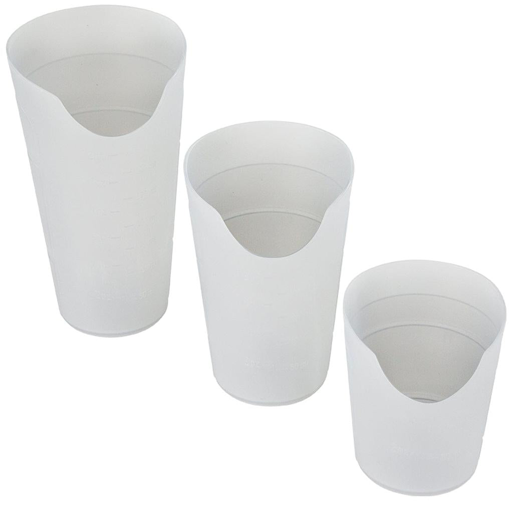 Three white plastic cups of different sizes on a white background