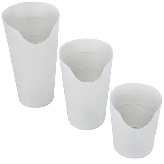 Three white plastic cups of different sizes on a white background