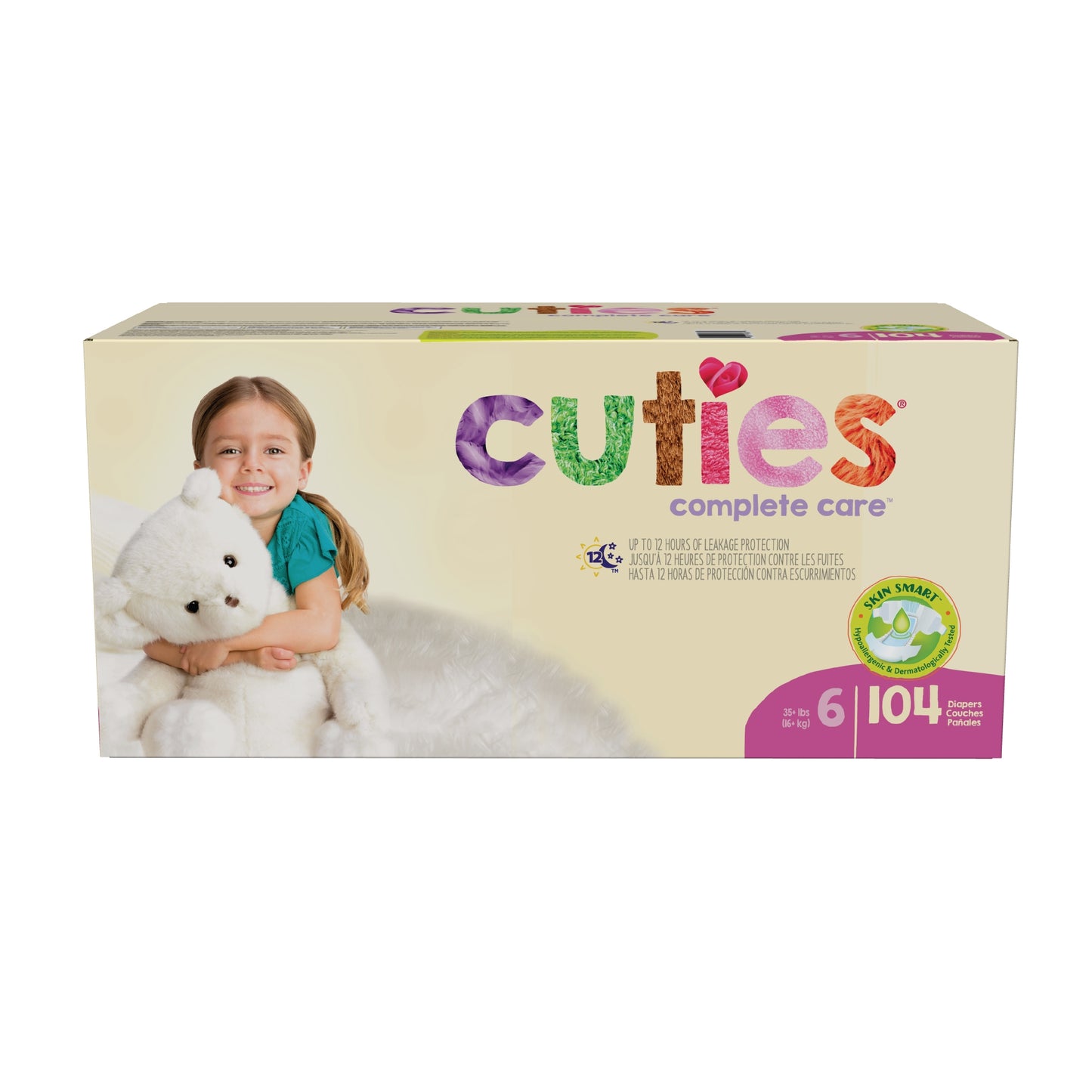 Box of Cuties complete care diapers with a child holding a teddy bear on a white background