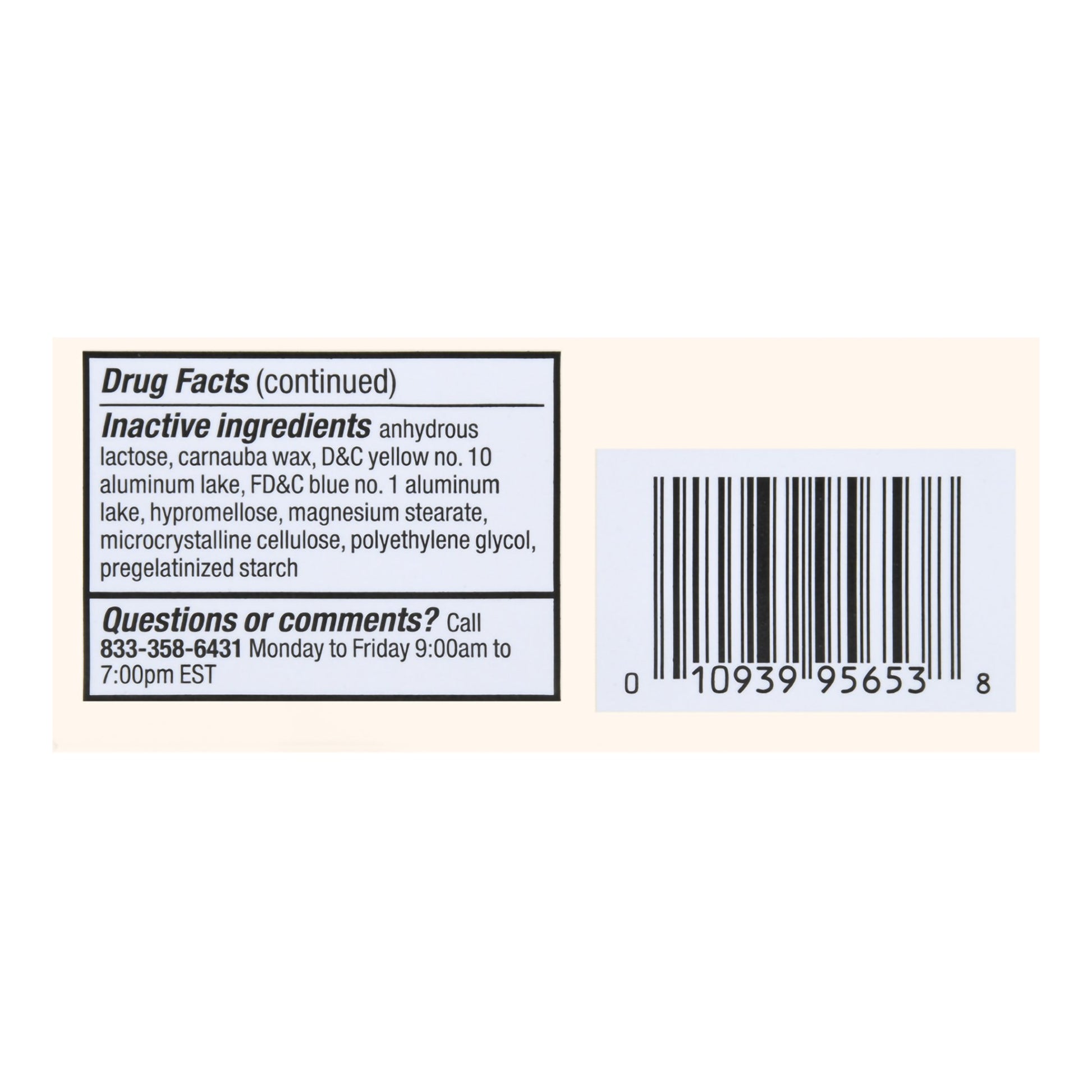Drug facts label with inactive ingredients and a barcode on a beige background