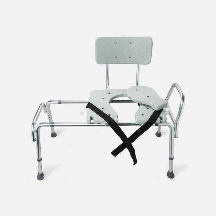 A silver metal shower chair with a light gray molded plastic seat, backrest, and armrests, featuring a black restraint strap across the seat, shown on a light gray background.