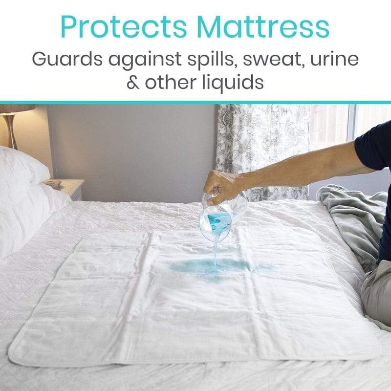 Person pouring liquid onto a mattress protector in a bedroom setting