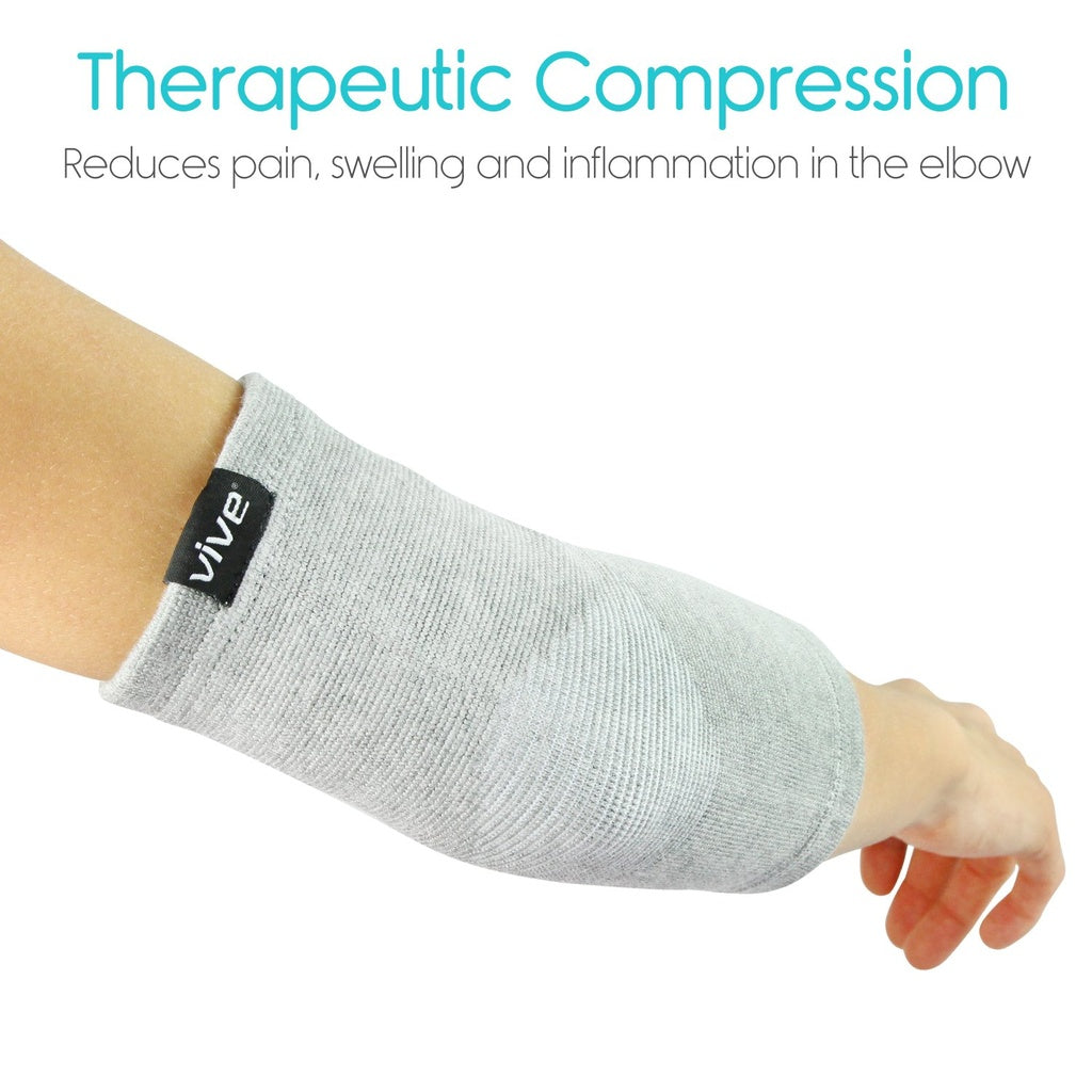 Gray compression sleeve on an elbow with 'Vive' branding, labeled for therapeutic use.