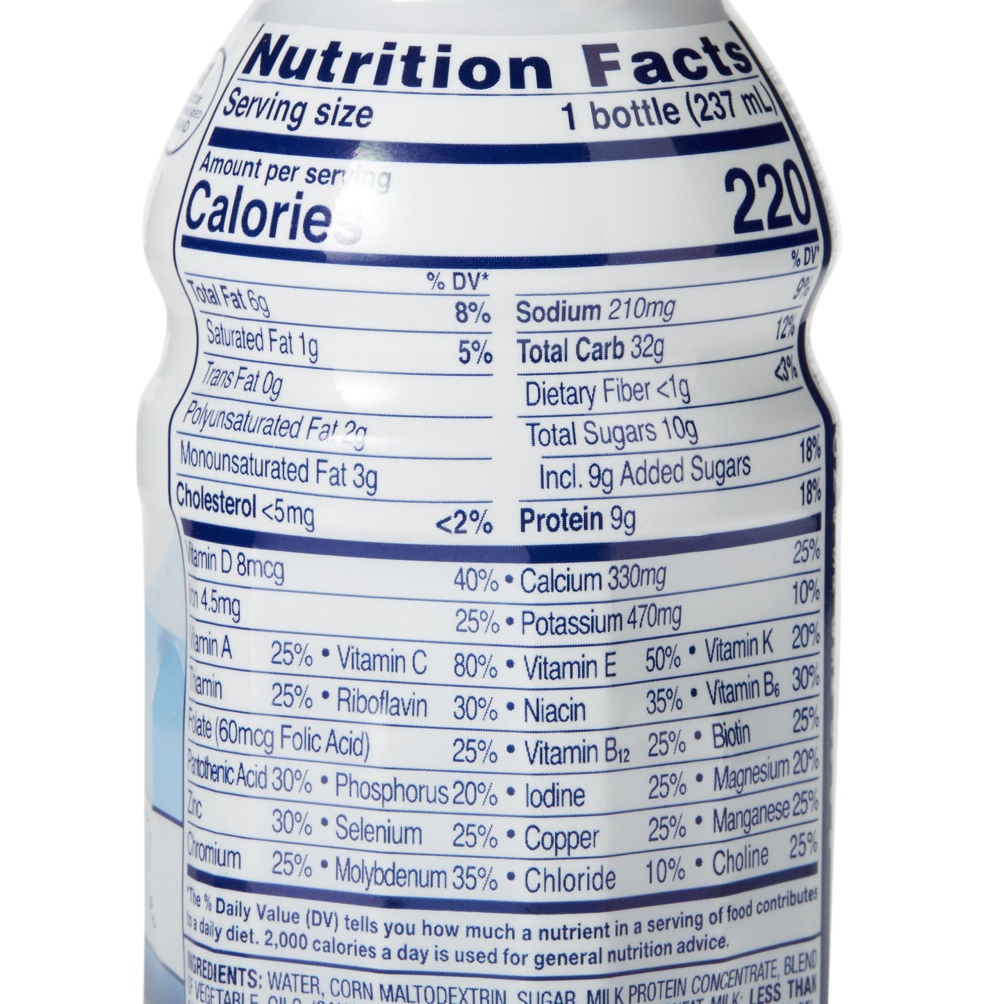 Nutrition facts label on a bottle with serving size, calories, and vitamin information.