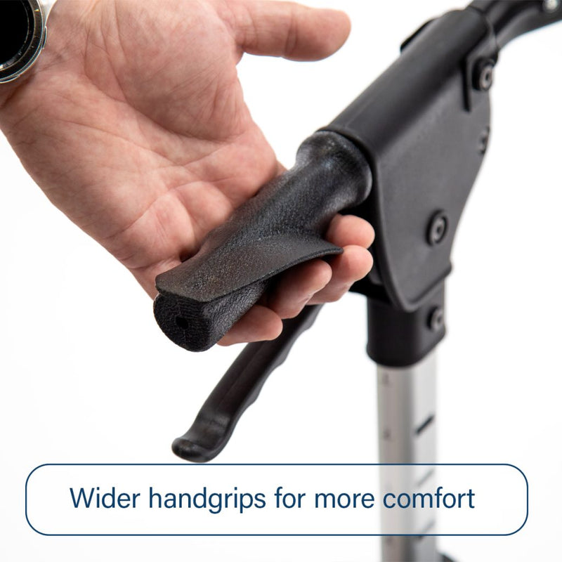 Hand holding a black handle with text 'Wider handgrips for more comfort' on a white background