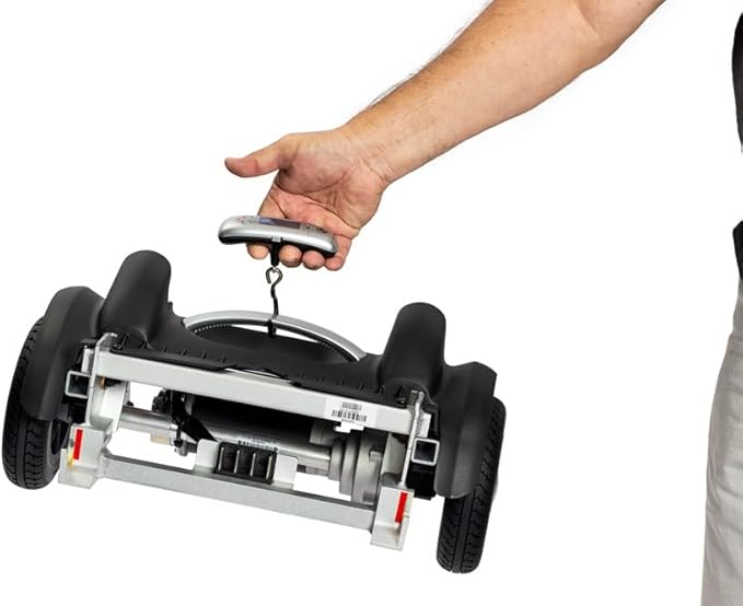 Hand holding a small electronic device above a hoverboard on a white background
