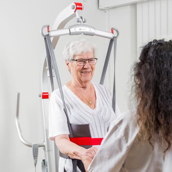 patient using standing sling