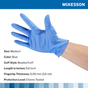 Blue medical glove with McKesson branding on a white background