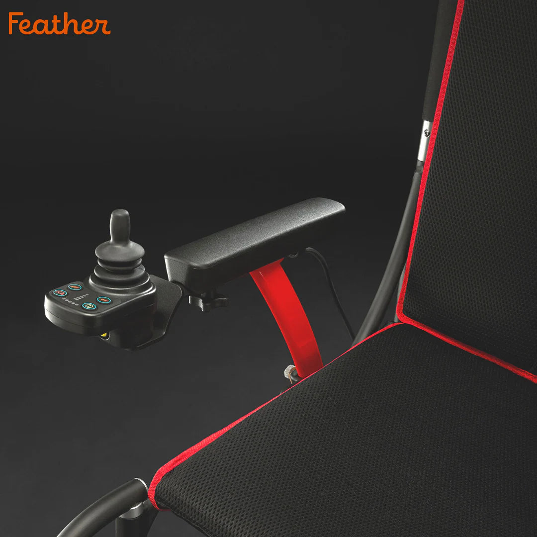 Control joystick with red armrest on a black gaming chair, featuring the brand 'Feather'.