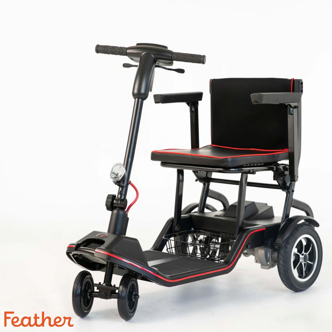 Black and red mobility scooter with 'Feather' branding on a white background