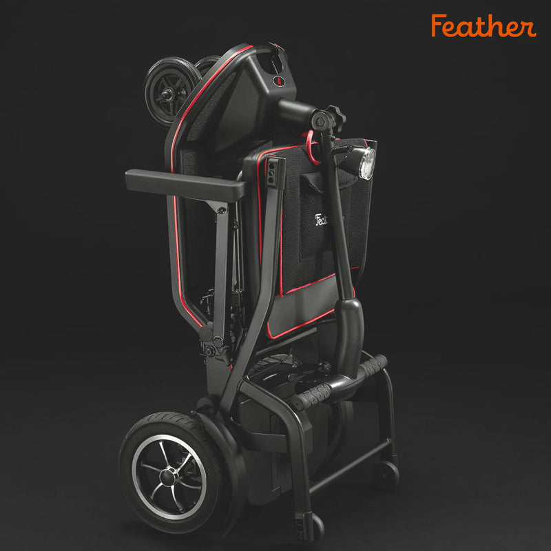 Black and red scooter with 'Feather' branding on a dark background