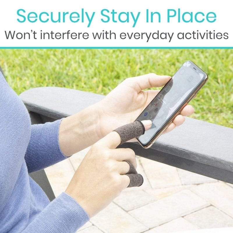 Person using a smartphone with a grip device, sitting on a chair outdoors.