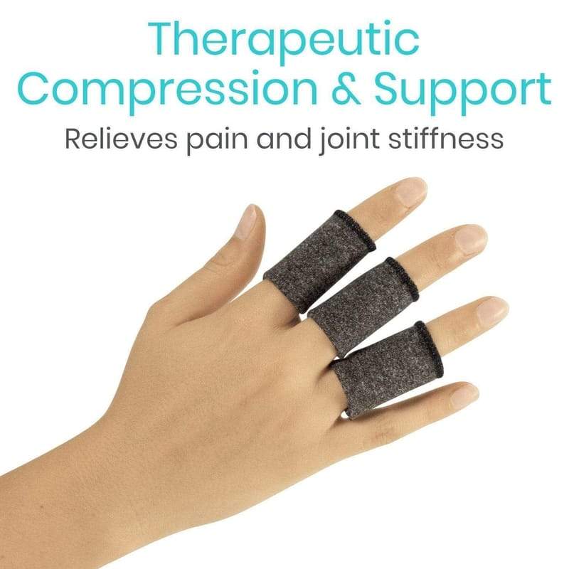 Hand with finger compression support device on a white background
