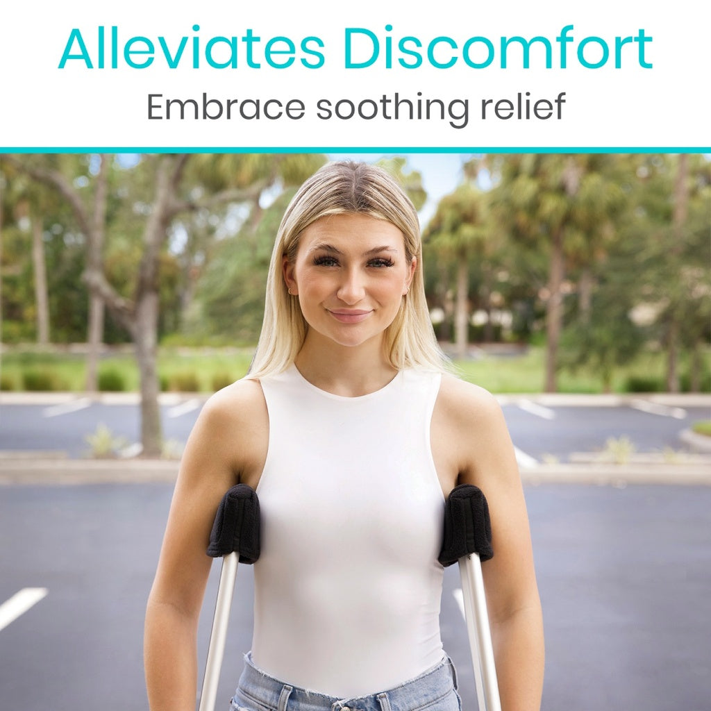 Woman using crutches with arm supports in a park setting, text 'Alleviates Discomfort Embrace soothing relief'.