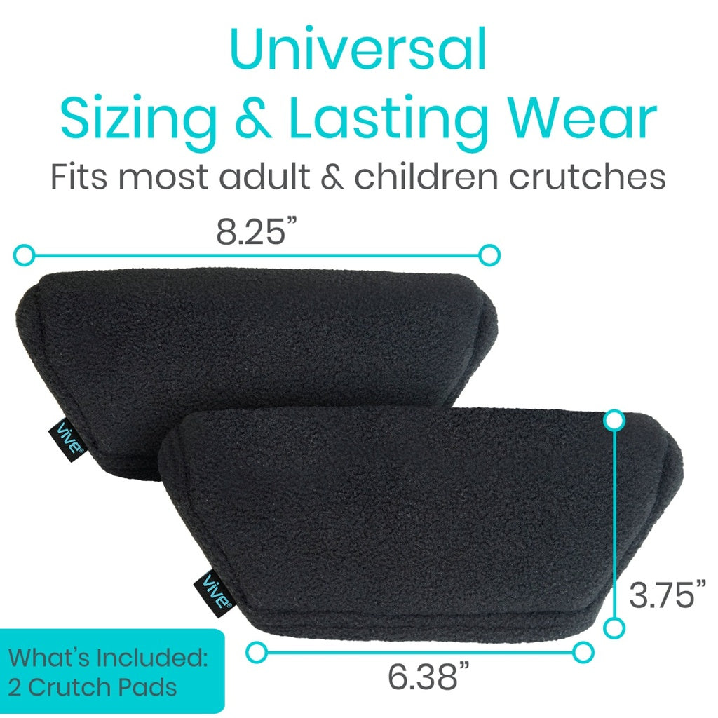 Black crutch pads with measurements and text on a white background