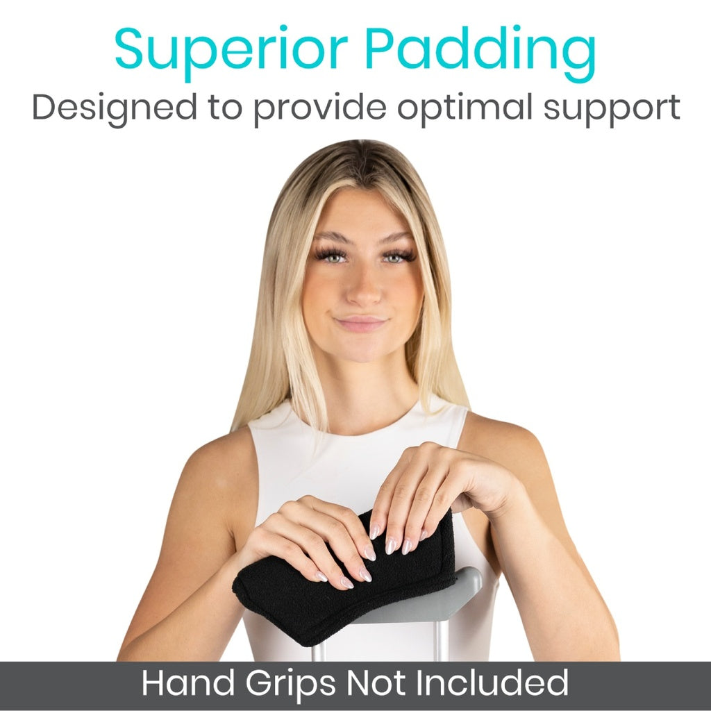 Woman holding a black hand grip with text about superior padding and support.