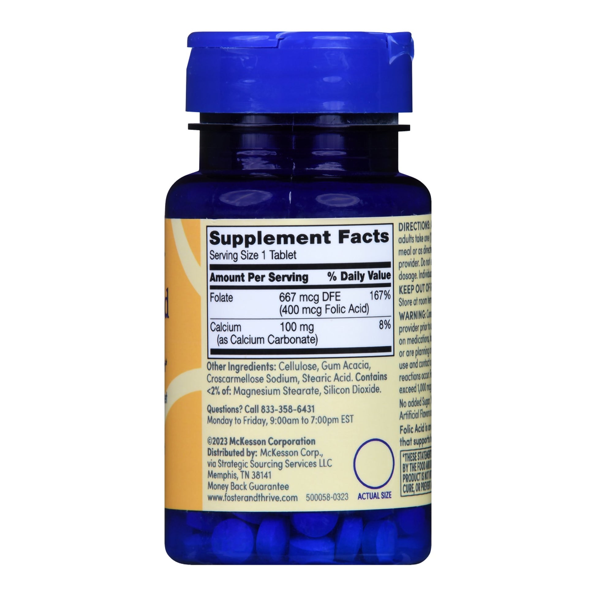 Blue supplement bottle with label on a white background