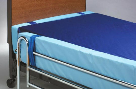Bed with blue mattress cover and wooden headboard on a gray background