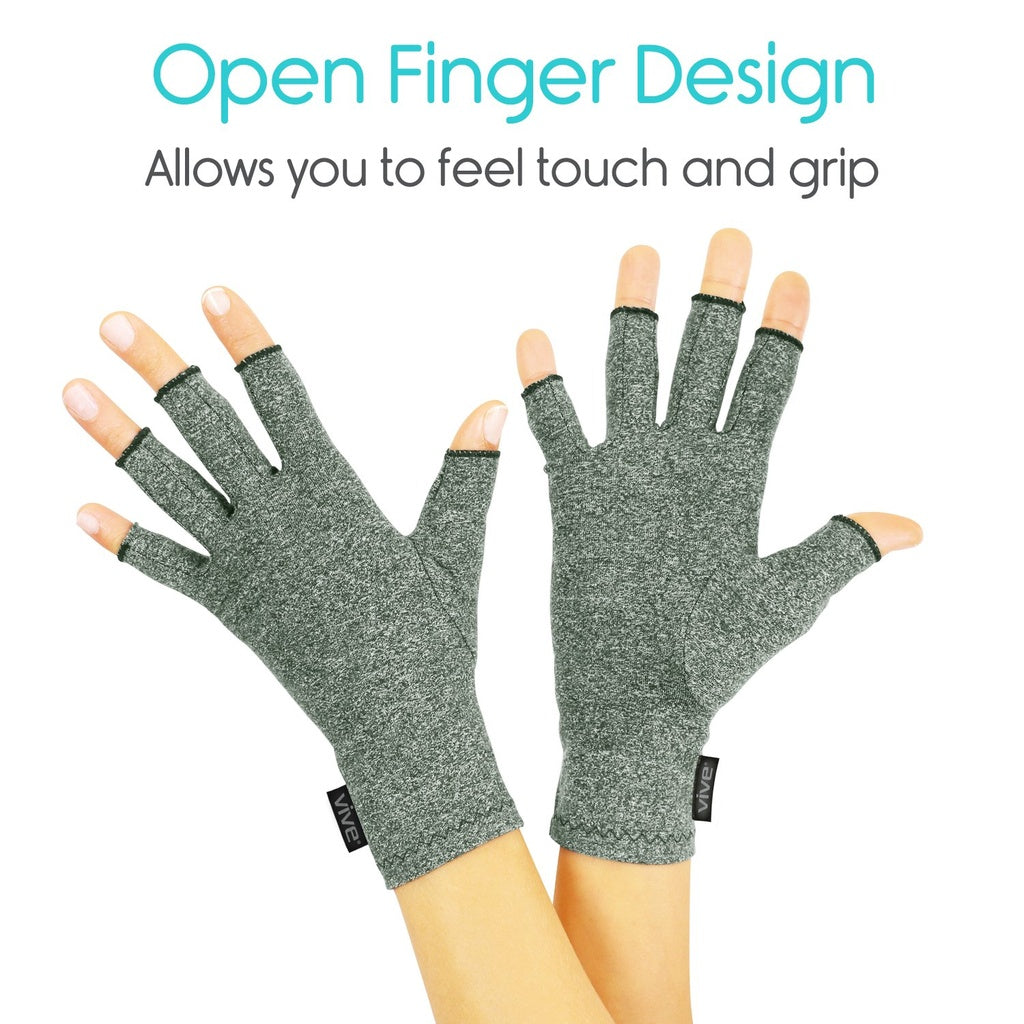 Pair of gray open finger design gloves on a white background