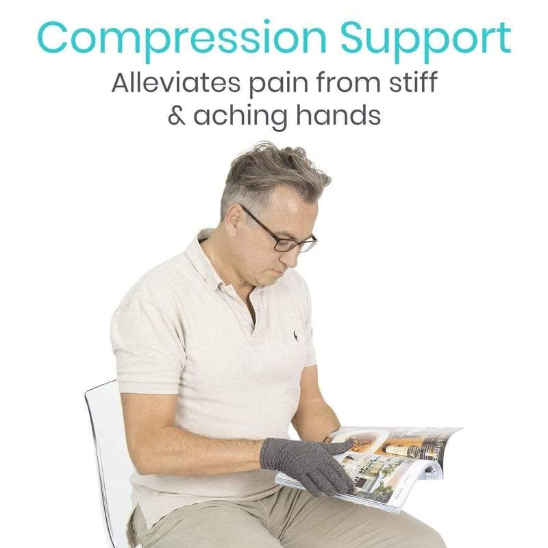 Man reading a newspaper wearing a compression glove with text about compression support.