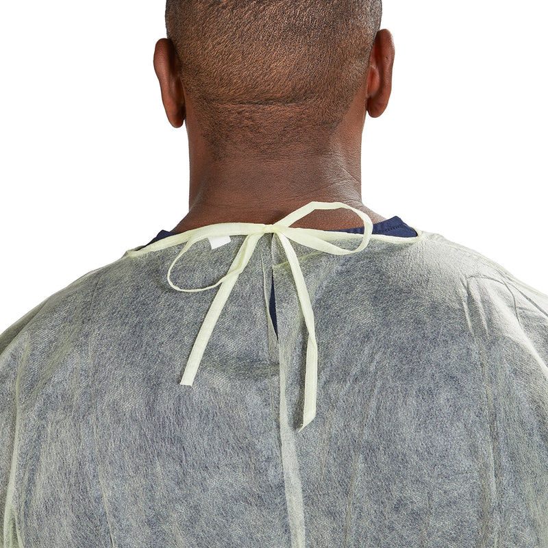 Person wearing a gray medical gown with a neck tie on a white background