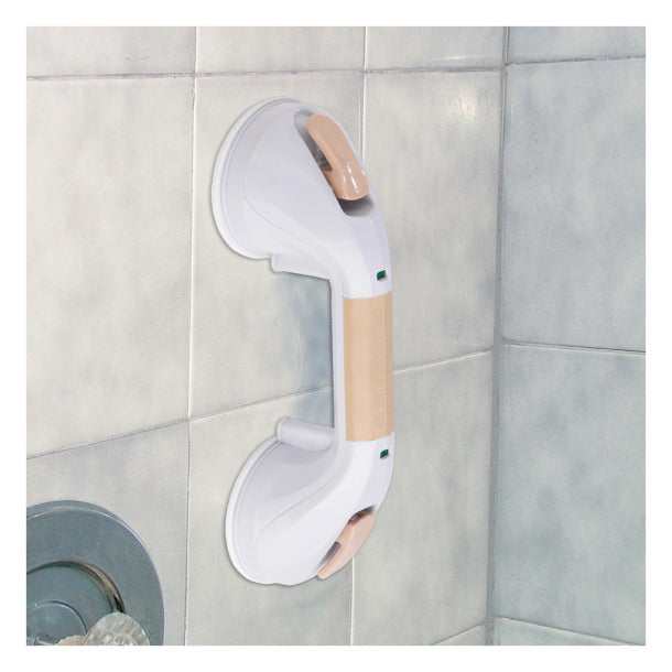 Bathroom safety grab bar attached to a tiled wall