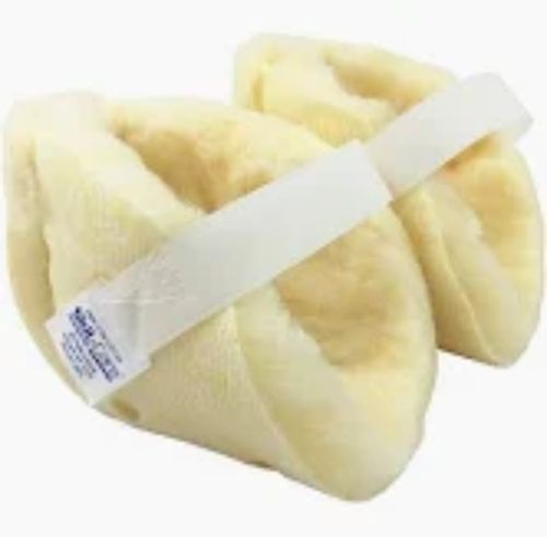 Roll of yellow fabric with a white strap on a white background