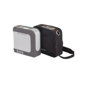 Two portable electronic devices, one gray and one black, on a white background.