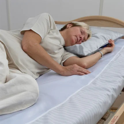 woman sleeping on transfer sheet