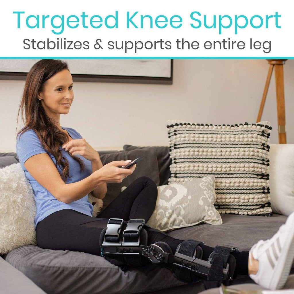 Woman sitting on a couch using targeted knee support, with text highlighting its benefits.