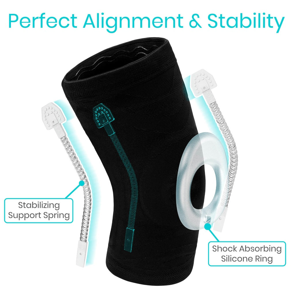 Black knee brace with stabilizing support spring and shock absorbing silicone ring on a white background