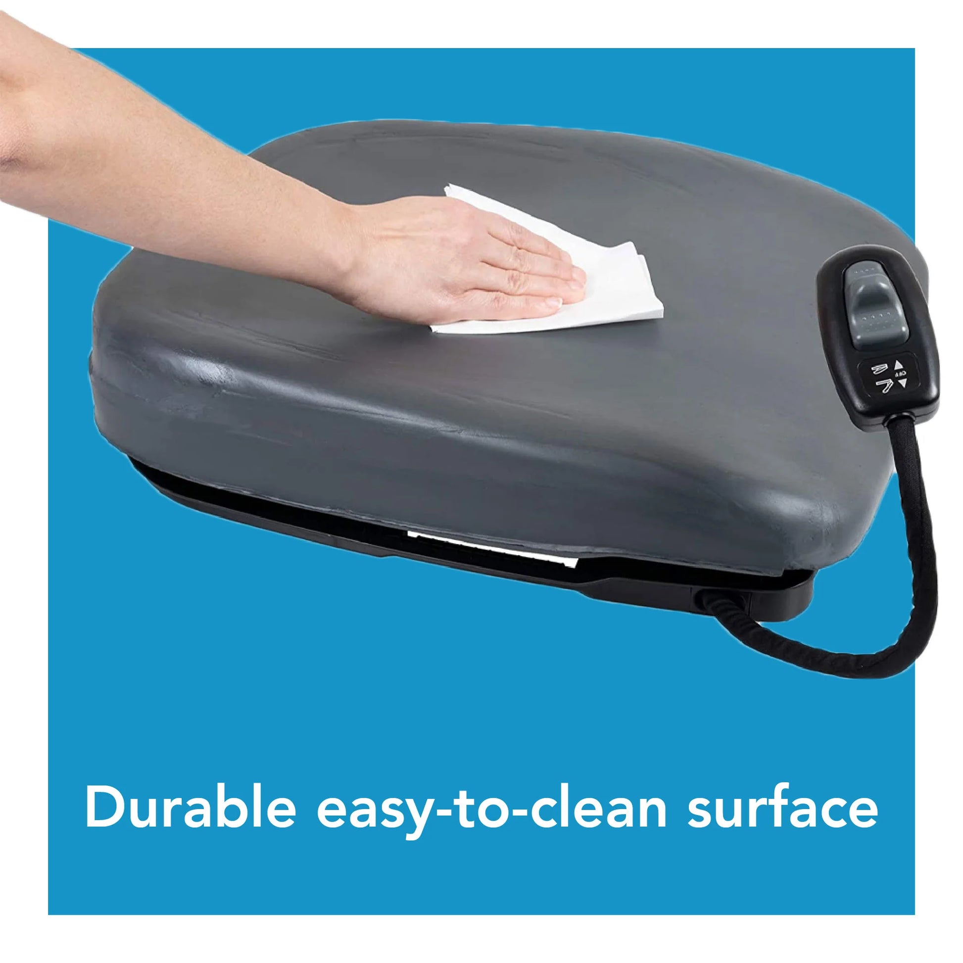 Hand cleaning a gray surface with a white cloth on a blue background